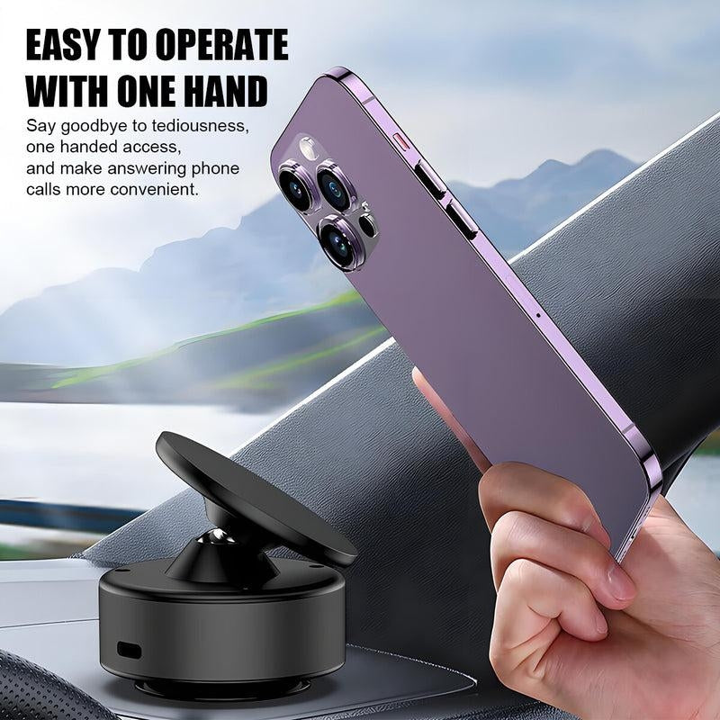 Hand holding a purple smartphone with a car mount against a scenic background